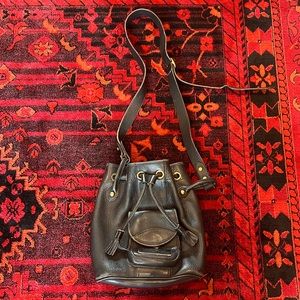 Vintage black leather Dooney & Burke bucket bag crossbody strap